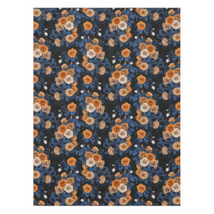 Hidden in the roses, orange and blue tablecloth