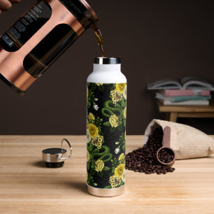 Hidden in the roses, yellow  and green water bottle