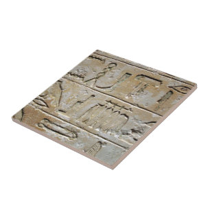 Hieroglyphics on a stone wall tile