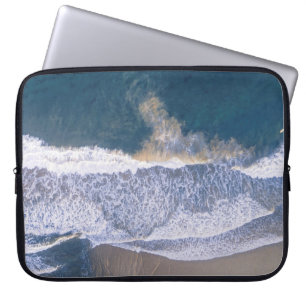 HIGH-ANGLE PHOTOGRAPHY OF BEACH SHORE LAPTOP SLEEVE