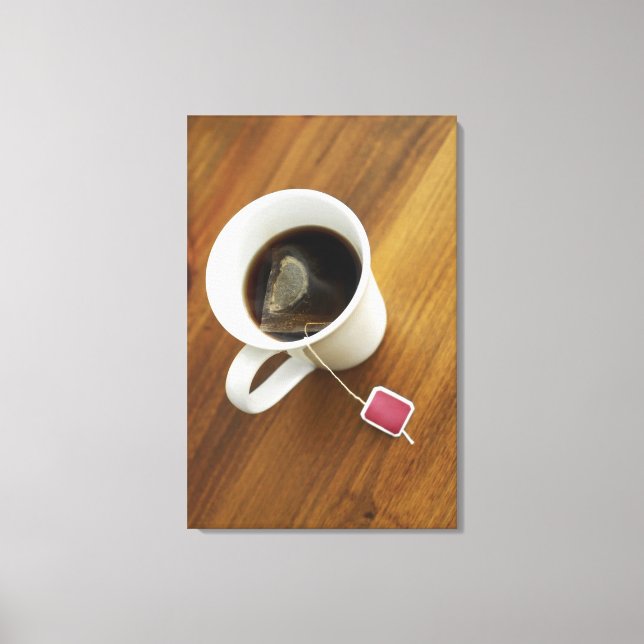 High angle view of a cup of tea canvas print (Front)