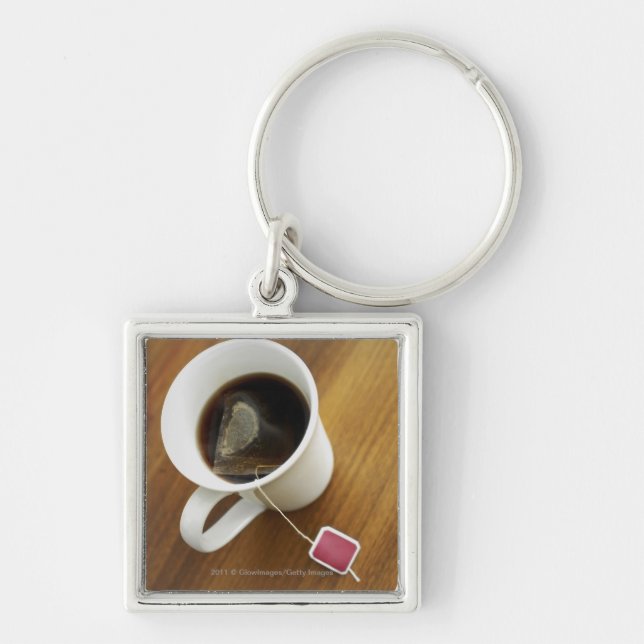 High angle view of a cup of tea key ring (Front)