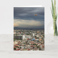 High Angle View Of Cityscape Against Cloudy Sky