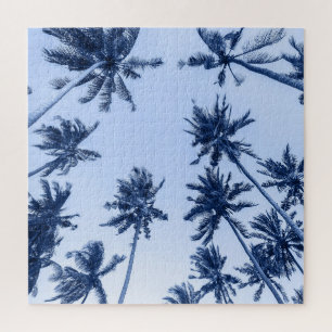 High palm trees, clear blue sky. jigsaw puzzle