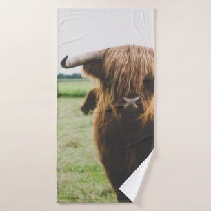 HIGHLAND CATTLE AT THE FIELD DURING DAY BATH TOWEL