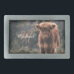 Highland cow calf autumn grass monogram initial belt buckle<br><div class="desc">Highland cow calf autumn grass field photograph. Stunning young calf of highland scottish cattle on an autumn grassy field with muted colours. Beautiful dark hairy orange coat contrasting with light yellow green grass and trees in bokeh in background. Custom personalizable monogram with your name and inital on the left.</div>