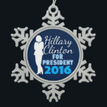 Hillary Clinton Silhouette President 2016 Snowflake Pewter Christmas Ornament<br><div class="desc">Woman's silhouette in a business suit on a blue background to support Hillary Clinton for the democratic candidate in the 2016 presidential election. She's got my vote.</div>