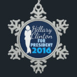 Hillary Clinton Silhouette President 2016 Snowflake Pewter Christmas Ornament<br><div class="desc">Woman's silhouette in a business suit on a blue background to support Hillary Clinton for the democratic candidate in the 2016 presidential election. She's got my vote.</div>