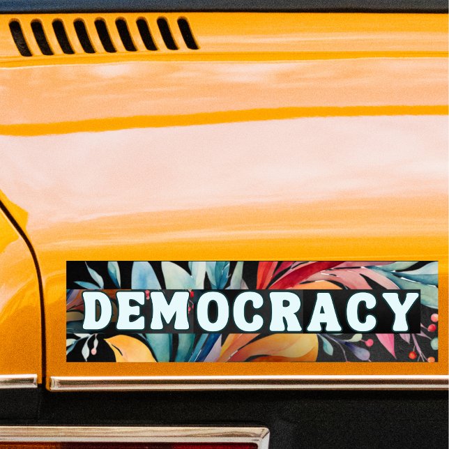 Hippie Retro Groovy Democracy Political Politics Bumper Sticker (A bumper sticker with the word 'Democracy' in retro groovy lettering, on a colorful background)