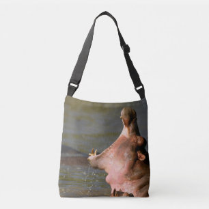 Hippo open his mouth in the pond. Serengeti Africa Crossbody Bag