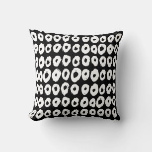 Hipster style pattern with doughnut like shapes in cushion