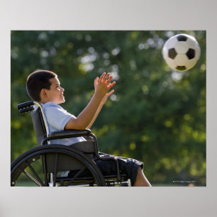 Hispanic boy, 8, in wheelchair with soccer ball poster