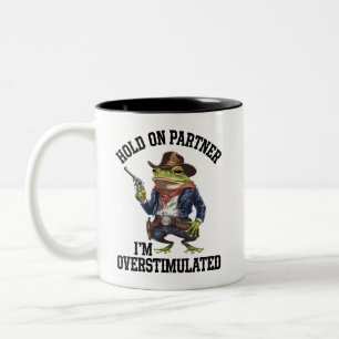 Hold On Partner I'm Overstimulated Cowboy Frog Two-Tone Coffee Mug