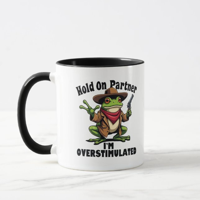 Hold on partner i'm overstimulated Frog ADHD  Mug (Left)