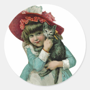 Holding a Christmas Kitten Classic Round Sticker