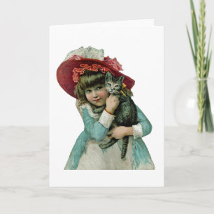 Holding a Christmas Kitten Holiday Card