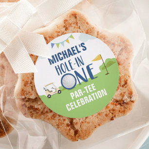 Hole in one first birthday sticker in blue