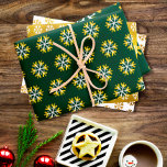 Holiday gold foil white green snowflake pattern wrapping paper sheet<br><div class="desc">A fun, playful, gold and white snowflake graphic pattern in three graphic sizes, on a rich dark green and faux gold foil textured backgrounds, helps you usher in the holiday season of Christmas and Hanukkah. Feel the warmth and joy of the holidays whenever you use this stunning, chic, modern, holiday...</div>
