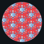 Holiday red and blue snowflakes and stars classic round sticker<br><div class="desc">Holiday red and blue snowflakes and stars pattern. 
Need more? Check out other holiday designs at my store! Cheers! :)</div>