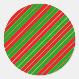 Holiday stripes in red and green classic round sticker