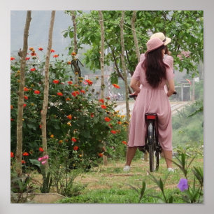 holiday, young asian girl in dress on the bike poster