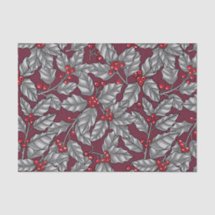 Holly berry, grey leaves on dark red tissue paper