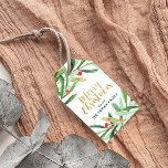 Holly Wreath Merry Christmas Gift Tags<br><div class="desc">These holly wreath merry christmas gift tags are perfect for a classic holiday gift. The design features a watercolor green wreath with red berries and an elegant faux gold glitter font. Personalise the gift tags with your name. Please Note: This design does not feature real gold glitter. It is a...</div>