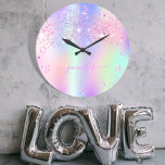 Holographic unicorn glitter rainbow monogram large clock<br><div class="desc">A trendy holographic background with unicorn and rainbow pastel colors in pink, purple, rose gold, mint green. Decorated with faux glitter dust in pink and purple. Personalize and add a name, written with a modern hand lettered style script with swashes. Pink colored letters. To keep the swashes only delete the...</div>