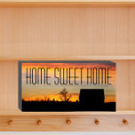 Home Sweet Home Sunset Silhouette Wooden Box Sign<br><div class="desc">Black painted,  wooden box sign designed for hanging or standing that features the photo image of a colourful sunset sky and black silhouette of a house along with the words,  "HOME SWEET HOME" printed in large,  black letters. A sweet addition to any home!</div>