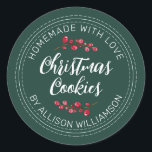 Homemade Christmas Cranberry Cookies Dark Green Classic Round Sticker<br><div class="desc">Rustic and modern homemade baked goods sticker with the text homemade with love, christmas cookies and your name in off-black handwritten script calligraphy and modern typography on a dark green background with a stylish touch of cranberries sprigs. Simply add your name and the product name to the label. Exclusively designed...</div>