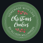 Homemade Christmas Cranberry Cookies Green Classic Round Sticker<br><div class="desc">Rustic and modern homemade baked goods sticker with the text homemade with love, christmas cookies and your name in off-black handwritten script calligraphy and modern typography on a green background with a stylish touch of cranberries sprigs. Simply add your name and the product name to the label. Exclusively designed for...</div>