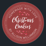 Homemade Christmas Cranberry Cookies Red Classic Round Sticker<br><div class="desc">Rustic and modern homemade baked goods sticker with the text homemade with love, christmas cookies and your name in off-black handwritten script calligraphy and modern typography on a red background with a stylish touch of cranberries sprigs. Simply add your name and the product name to the label. Exclusively designed for...</div>