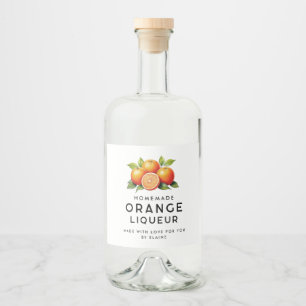 Homemade orange liqueur with oranges and leaves liquor bottle label
