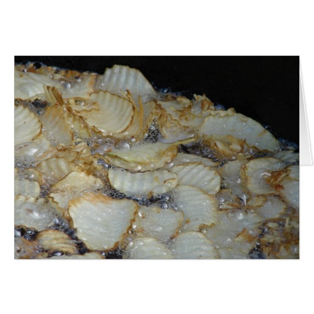 Homemade Potato Chips Frying In Oil (Front Horizontal)