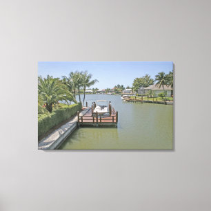 Homes and docks on canal Marco Island Florida Canvas Print