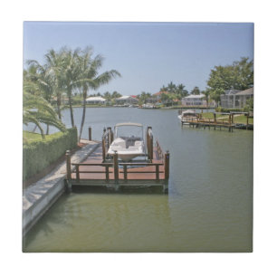 Homes and docks on canal Marco Island Florida Tile