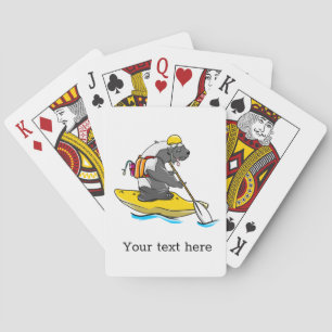 Honey badger in a kayak playing cards