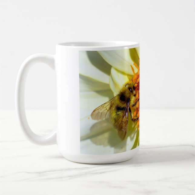 Honey bee and flower coffee mug. coffee mug (Left)