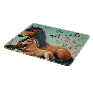 Horse and Foal Resting in a Spring Setting  Cutting Board