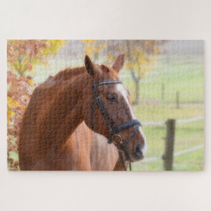 Horse in an autumn field with falling leaves jigsaw puzzle