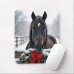 Horse With a Christmas Wreath Mouse Mat<br><div class="desc">A horse stands behind a wooden fence adorned with a festive wreath and red bow,  surrounded by a snowy winter landscape</div>