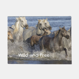 Horses galloping in the water doormat