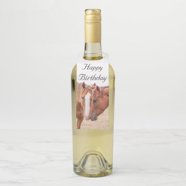 Horses nuzzling in a pasture bottle tag (On Bottle)