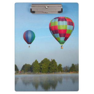 Hot air balloons over a lake,  NZ Clipboard
