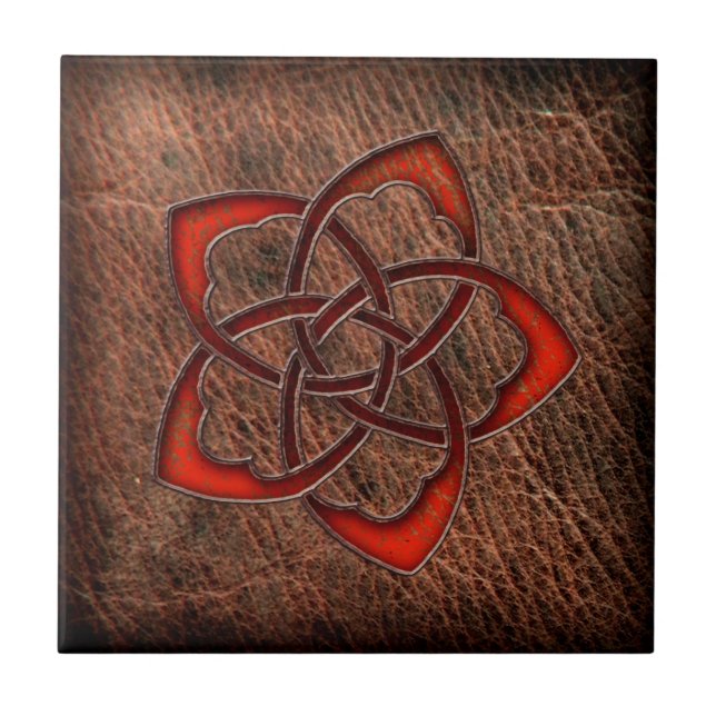 Hot orange celtic flower on leather tile (Front)