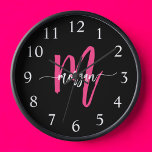 Hot Pink Black Modern Script Girly Monogram Name  Clock<br><div class="desc">Make a bold statement in your space with our Hot Pink Modern Script Girly Monogram Name Large Clock! Featuring a vibrant hot pink design and personalised with your name in an elegant modern script, this clock adds a stylish and personal touch to any room. Perfect for bedrooms, offices, or living...</div>