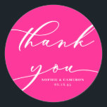 Hot Pink Calligraphy Wedding Thank You Classic Round Sticker<br><div class="desc">Send thanks with this customisable script thank you stickers. It features modern calligraphy and classic typography with a hot pink background. Personalise this script thank you sticker by adding your own details. This hot pink and white thank you card will be perfect for wedding favours and as an envelope seal....</div>