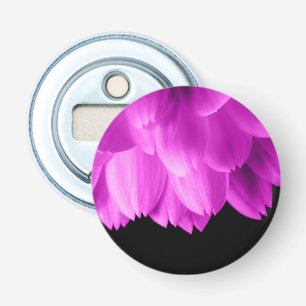 Hot pink flower petals on black bottle opener
