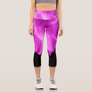 Hot pink flower petals on black capri leggings