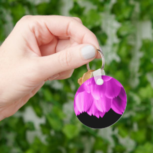 Hot pink flower petals on black key ring